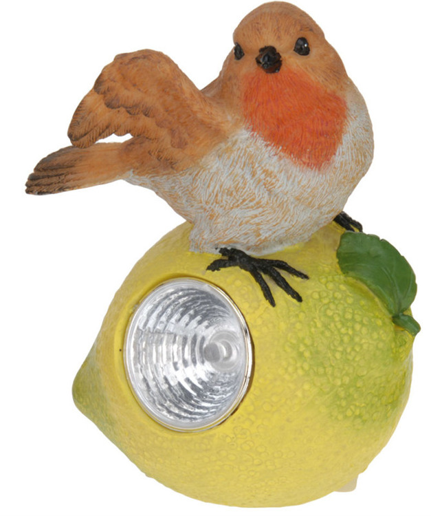 Lampa solarna ptaszek na owocu figurka kamienna
